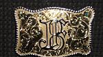 Western style belt buckle and sterling jewelry